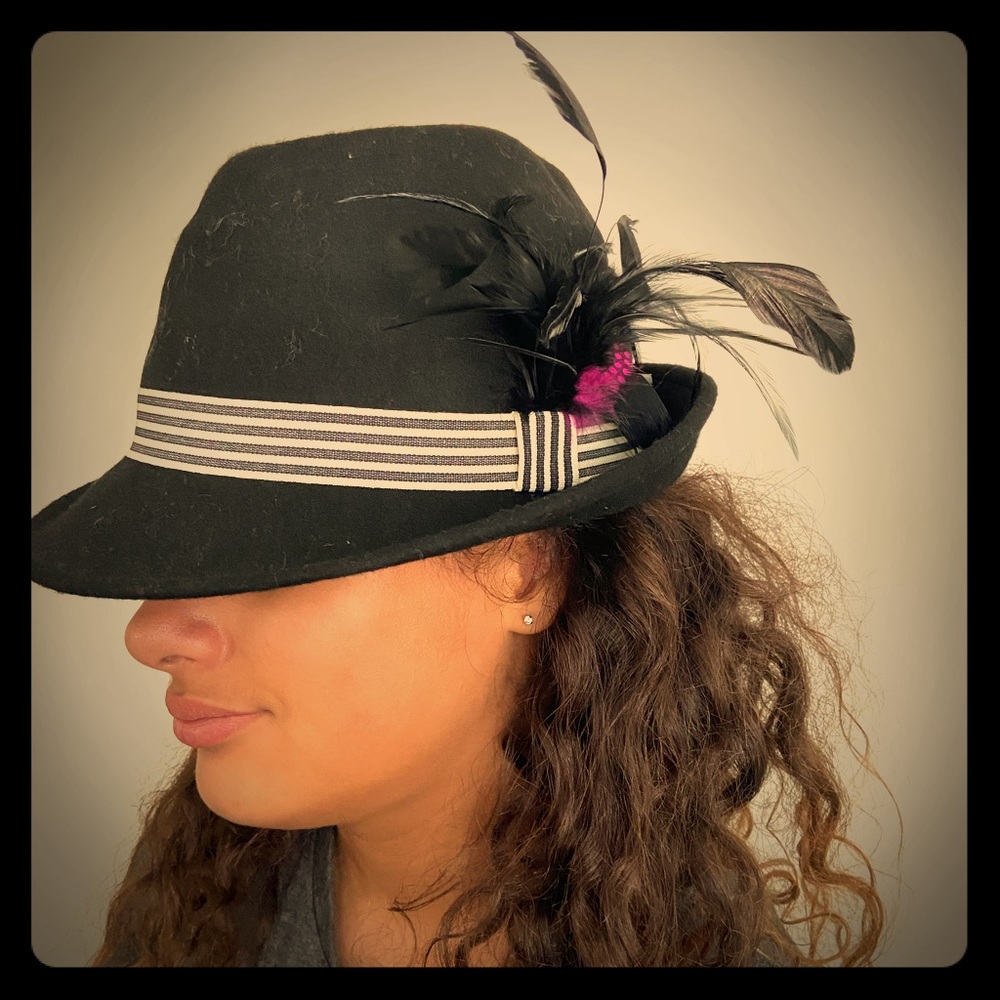 Black fedora hat with feather.